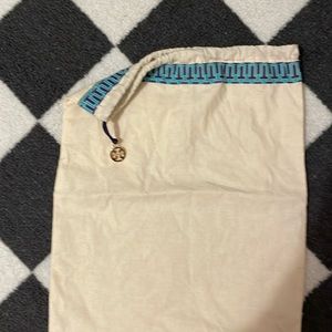Tory Burch draw string dust bag.